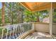 Cozy balcony overlooking lush landscaping and mature trees, perfect for relaxing at 8411 Carmel Ridge Ct, Las Vegas, NV 89113