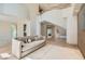 Bright living room boasts a modern staircase, sleek lines, and natural light from large windows at 8411 Carmel Ridge Ct, Las Vegas, NV 89113