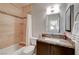Cozy bathroom with shower and marble sink at 8719 Villa Ariel Ln, Las Vegas, NV 89147