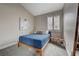 Bedroom with modern decor, natural light, and neutral wall color at 8719 Villa Ariel Ln, Las Vegas, NV 89147