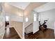 Loft area with wood floors and exercise bike at 8719 Villa Ariel Ln, Las Vegas, NV 89147