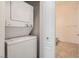 Laundry room features stackable washer and dryer set at 8805 Jeffreys St # 2073, Las Vegas, NV 89123