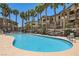 A luxurious pool and lounge area offers a resort-style experience in a vibrant community setting at 8805 Jeffreys St # 2073, Las Vegas, NV 89123