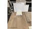 Image showcases flooring samples, including luxury vinyl plank, carpet, and quartz countertops at 9649 Hinson St, Las Vegas, NV 89139