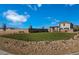 Picturesque park with lush lawn and picnic area, set against a backdrop of homes and a clear sky at 9661 Hinson St, Las Vegas, NV 89139