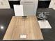 Selection of interior finishes including wood floors and white countertops at 9661 Hinson St, Las Vegas, NV 89139
