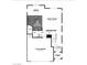 First floor floor plan of an open-concept home featuring a two-car garage at 9687 Biedler Ct # Lot 2, Las Vegas, NV 89178