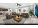 Open concept living room with modern decor, neutral colors, and plenty of natural light at 9687 Biedler Ct # Lot 2, Las Vegas, NV 89178