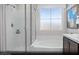 Bright primary bathroom with tub, shower, and double vanity at 9687 Biedler Ct # Lot 2, Las Vegas, NV 89178