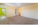Bright bedroom with carpet flooring and multiple entryways for seamless flow at 9753 Villa Lorena Ave, Las Vegas, NV 89147
