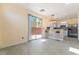 Open dining area features tile floors, patio access, and a breakfast bar at 9753 Villa Lorena Ave, Las Vegas, NV 89147