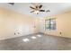 Bright living room with tile floors, neutral walls, and natural light from windows at 9753 Villa Lorena Ave, Las Vegas, NV 89147