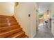 Wooden staircase adjacent to dining area and backyard access at 9753 Villa Lorena Ave, Las Vegas, NV 89147