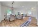 Open concept living and dining area is bright and well-lit with access to the bedroom at 1001 Domnus Ln # 201, Las Vegas, NV 89144