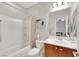 Bathroom featuring a shower and bathtub combo at 10697 Acacia Park Pl, Las Vegas, NV 89135