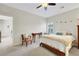 Bright bedroom with natural light and a view into the en suite bathroom at 10697 Acacia Park Pl, Las Vegas, NV 89135