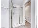 Bathroom with a glass enclosed shower and toilet at 11028 Meadow Leaf Ave, Las Vegas, NV 89144
