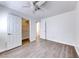 Bedroom with a closet, neutral walls, and wood-look floors at 11028 Meadow Leaf Ave, Las Vegas, NV 89144