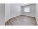 Bedroom featuring hardwood floors and a window at 11028 Meadow Leaf Ave, Las Vegas, NV 89144