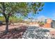 Community park area with desert landscaping, walking paths, trees, and seating at 11028 Meadow Leaf Ave, Las Vegas, NV 89144