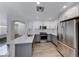 Stylish kitchen with modern appliances, white subway tile, and updated cabinetry at 11028 Meadow Leaf Ave, Las Vegas, NV 89144