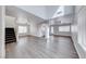 Spacious living room with stairs, hardwood floors, and a bright, open floor plan at 11028 Meadow Leaf Ave, Las Vegas, NV 89144