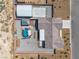 Aerial view features a home, hot tub, gazebo, and large metal storage shed at 111 Magnolia Blvd, Pahrump, NV 89048