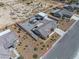 Aerial view featuring a home, hot tub, large garage, and desert landscaping at 111 Magnolia Blvd, Pahrump, NV 89048