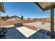 Expansive backyard with well-maintained landscaping and a functional barbecue area at 111 Magnolia Blvd, Pahrump, NV 89048