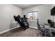 Bright bedroom features a window, carpet flooring and an office area at 111 Magnolia Blvd, Pahrump, NV 89048