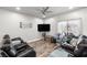 Cozy living room with plush seating, a ceiling fan and views of the neighborhood at 111 Magnolia Blvd, Pahrump, NV 89048