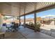 Inviting covered patio area perfect for outdoor dining and relaxation at 111 Magnolia Blvd, Pahrump, NV 89048