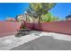 Backyard featuring patio, shade tree, and privacy wall at 11444 Steponia Bay St, Las Vegas, NV 89141