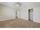 Bedroom with carpet, ceiling fan, and closet at 11444 Steponia Bay St, Las Vegas, NV 89141