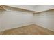Walk-in closet with carpet and shelving at 11444 Steponia Bay St, Las Vegas, NV 89141