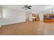 Open-concept living area featuring tile flooring and a view into the kitchen at 11444 Steponia Bay St, Las Vegas, NV 89141