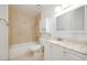 Bathroom featuring a tub with shower, toilet, sink and vanity at 1300 Pinto Rock Ln # 201, Las Vegas, NV 89128