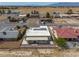 Single-Gathering home with desert landscaping, solar panels, and a private driveway in a quiet neighborhood at 1320 Daytona St, Pahrump, NV 89048