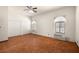 Spacious bedroom featuring tile flooring and ample closet space at 1320 Daytona St, Pahrump, NV 89048