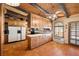 Spacious kitchen with white appliances, wood cabinets, and tile flooring at 1320 Daytona St, Pahrump, NV 89048