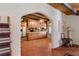 Spacious kitchen with tile floors, wood cabinets, and a view into the living room at 1320 Daytona St, Pahrump, NV 89048