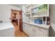 Large laundry room with plenty of built-in storage cabinets at 1320 Daytona St, Pahrump, NV 89048