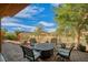 Outdoor patio space with seating and a mountain view at 153 Via Di Mello, Henderson, NV 89011