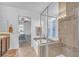 Bathroom featuring a soaking tub, walk-in shower, and neutral color palette at 153 Via Di Mello, Henderson, NV 89011