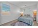 Bedroom with natural light, blinds, and calm decor, creating a serene and inviting atmosphere at 153 Via Di Mello, Henderson, NV 89011