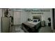Primary bedroom downstairs with a large bed and sliding door closet at 153 Via Di Mello, Henderson, NV 89011