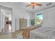 Bright bedroom with stylish furnishings, neutral tones and access to backyard at 153 Via Di Mello, Henderson, NV 89011