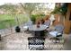 Covered patio with a brick deck provides a shaded area on a plunge pool sized lot, perfect for outdoor relaxation at 153 Via Di Mello, Henderson, NV 89011