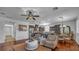 Bright and open living room featuring hard wood floors and neutral paint colors at 153 Via Di Mello, Henderson, NV 89011