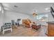 Bright recreation room with furniture and exercise equipment, designed for relaxation and fitness at 153 Via Di Mello, Henderson, NV 89011